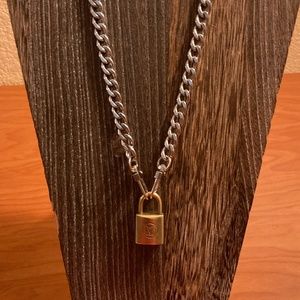 Vintage Louis Vuitton Padlock on a Cuban Chain with rounded clasps.  